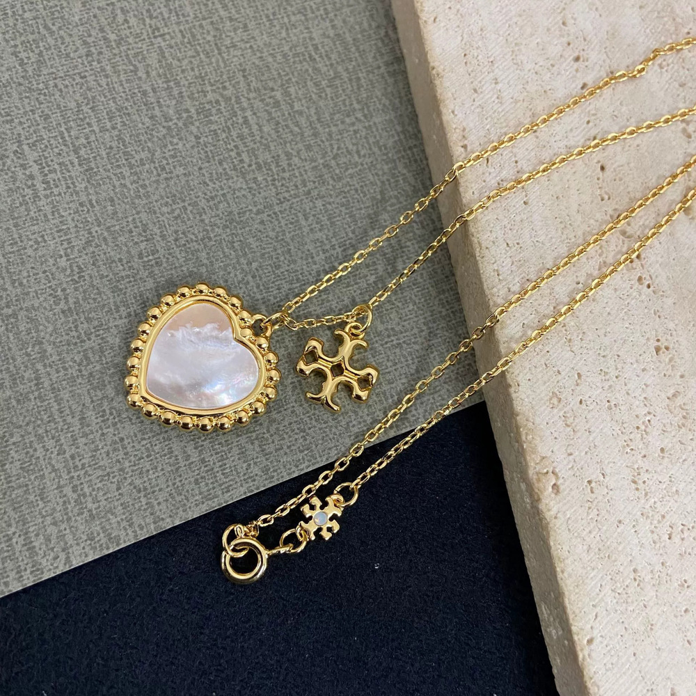 Tory Burch Trendy Pearl and Mother of Pearl Heart Necklace